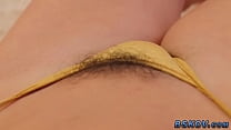 Booty fingered brunette gets rimmed