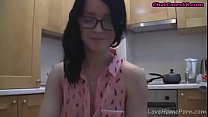 splendid teen with glasses chatting in the kitchen