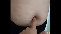 Milf enjoys a finger in the navel