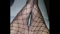 Goddess Cedez beautiful feet in fishnets.