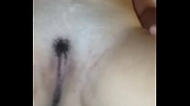 rubbing her pussy