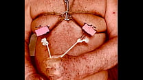 Seniormasochist pulls nipple clamps off