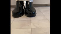 Rubber Boy Squeaks His Boots While Tied Up