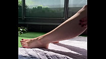 WIFE TEASES A FRIEND ON THE TERRACE WTH HER HUGE FEET
