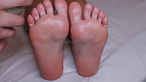 SUBMISSIVE GIVES HIS MISTRESS A FOOT MASSAGE