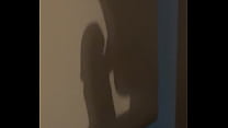 The shadow reflects her sucking his cock