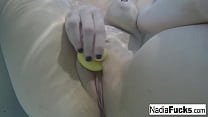 Sexy Nadia takes a bath with some rubber duckies