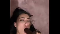Latina teen deepthroats a thick dildo