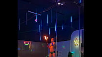 Destiny Mae dancing and playing with fire on stage at the strip club