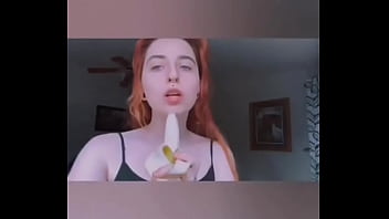 Girl sucking banana
