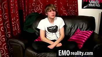 Twink emo teen talks to the camera and takes his clothes off