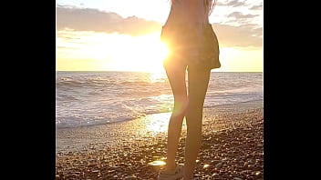 thumb sunset girl at  the sea beach  