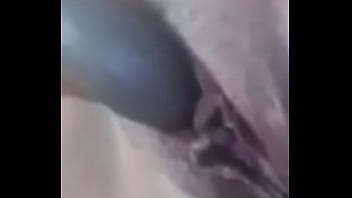 Latina amateur playing with her toy