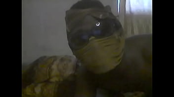 Nigerian gay boy fucking his ass with candle stick.