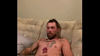 thumb slowly stroking  hard cock  