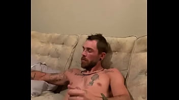 thumb slowly stroking  hard cock  
