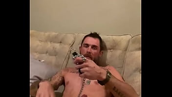 thumb slowly stroking  hard cock  