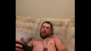 thumb slowly stroking  hard cock  