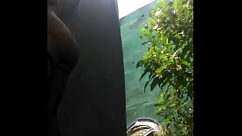 Black girl naked under the sun