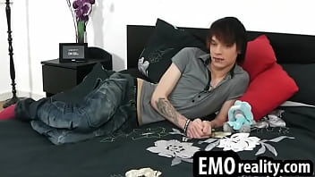 Sexy and young emo twink with make up and piercings getting naked