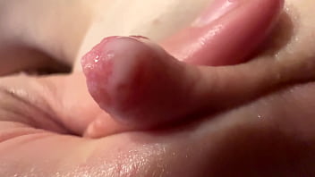 Female breast milk and nipple close up