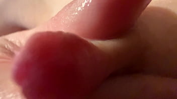 Female breast milk and nipple close up
