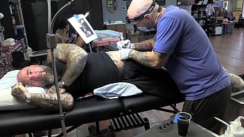 thumb getting a tatto  o  