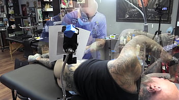 thumb getting a tatto  o  
