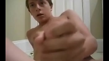 cute twink strokes his meat and cums on bathroom floor
