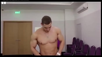 Bodybuilder playing with his ass