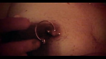 She loves teasing his pierced Nippels