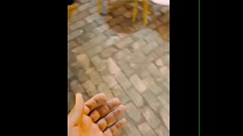 Giant man compares huge hand to small man