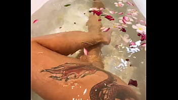 Horny Busty Milf in Flower Bath Plays with Her Pussy