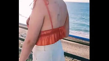 walking around with a dildo in her pussy
