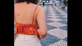 walking around with a dildo in her pussy