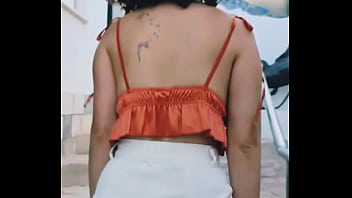 walking around with a dildo in her pussy