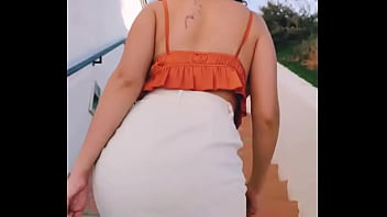 walking around with a dildo in her pussy