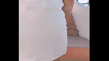 walking around with a dildo in her pussy