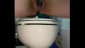 Solo male in chastity ridding dildo