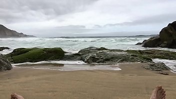 thumb self pee at a n  ude beach  