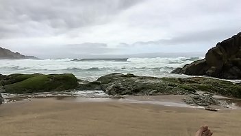 thumb self pee at a n  ude beach  
