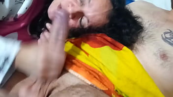 Mature woman sucking a young man's cock