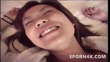 Young asian fucking her tight pussy