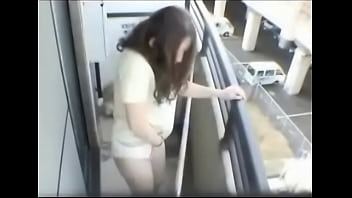 Asian Girl Masturbates on Balcony