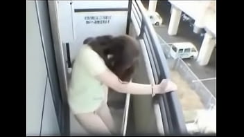 Asian Girl Masturbates on Balcony