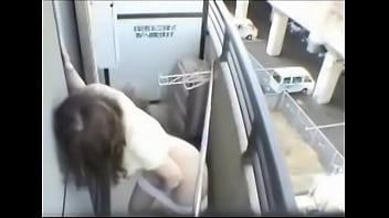 Asian Girl Masturbates on Balcony