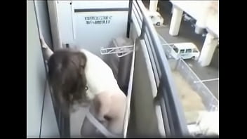 Asian Girl Masturbates on Balcony