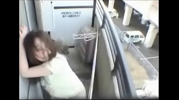 Asian Girl Masturbates on Balcony
