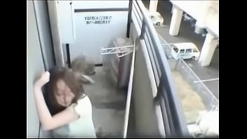 Asian Girl Masturbates on Balcony