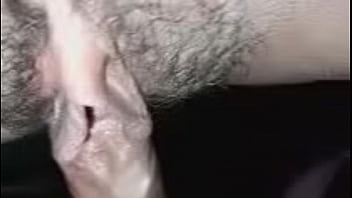 Spreading the pretty girl's pussy, using her tongue to lick her pussy before fucking her with his cock until he cums inside her pretty pussy and clit.